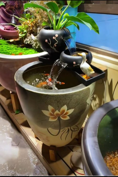 🌺 نافورة فخارية بزخارف اللوتس وإضاءة ناعمة